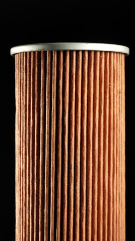 Air filter for engine car on background, close up, rotation. Auto parts accessories for retro cars. Air filter for removing fine particles, macro