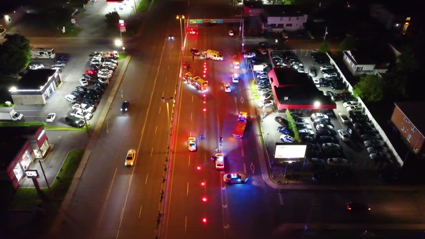 Fire safety and local police Longueuil Quebec Canada at critical accident spot