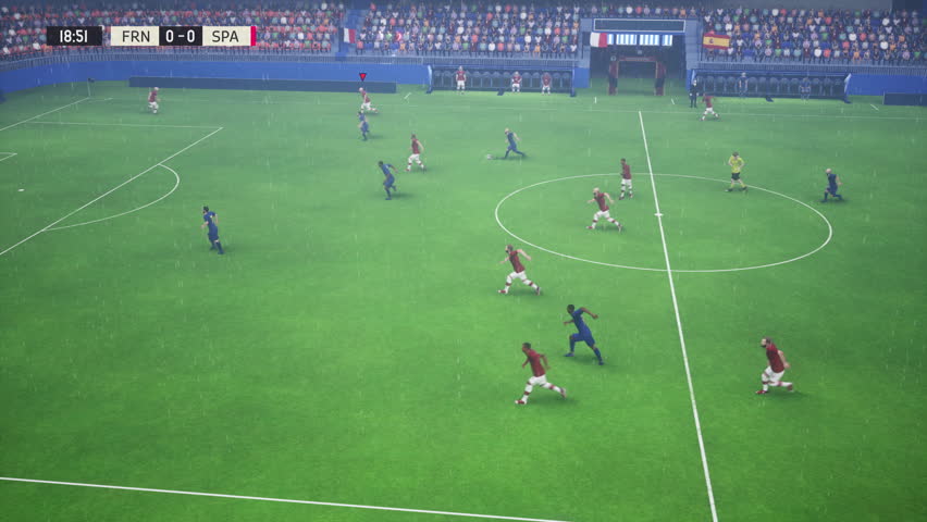 Playing the modern online soccer game on a PC in the rain. Player performing a combination to score a goal in a pc game match. Virtual Football players winning the PC game challenge. Victory.