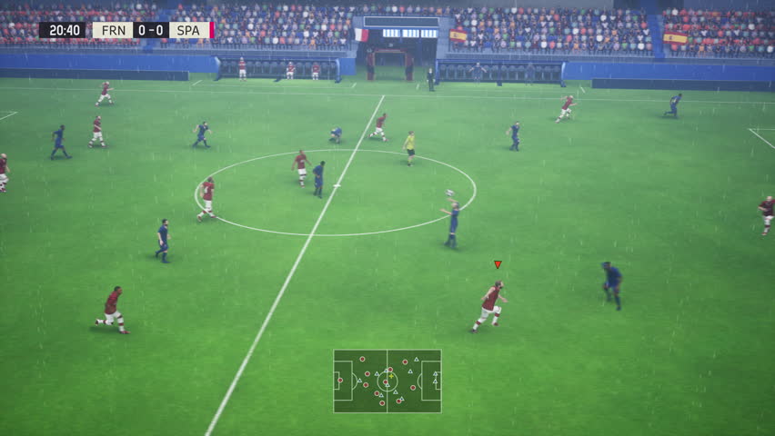Playing the modern online soccer game on a PC in the rain. Player performing a combination to score a goal in a pc game match. Virtual Football players winning the PC game challenge. Victory.