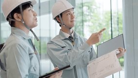 A man in work clothes having a meeting - Powered by Shutterstock - Get 15% off with code: PIKWIZARD15