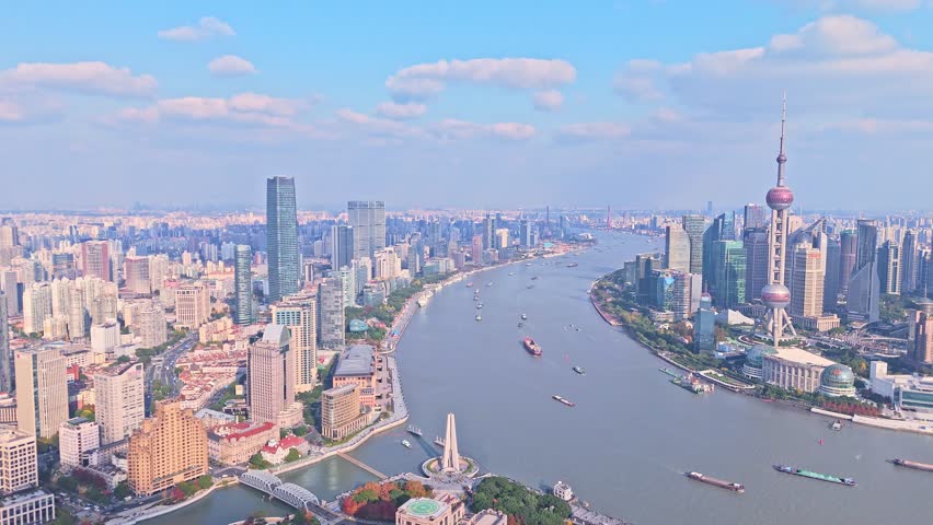 Shanghai, China - December 8th 2024: 4K Real Time Aerial View of Shanghai skyline in the afternoon