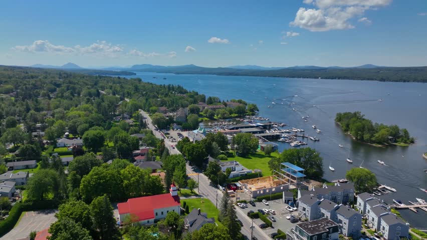 Magog city aerial view at the mouth of Magog River to Lake Memphremagog, Magog, Memphremagog County, Quebec QC, Canada. 