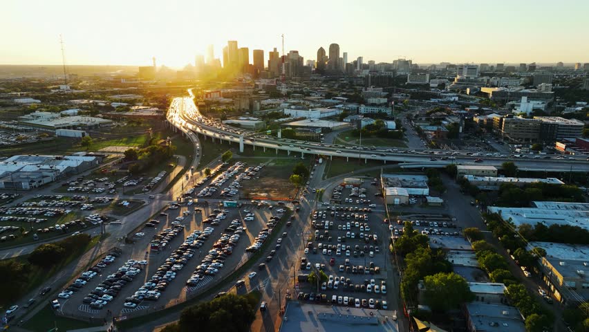 Cinematic view of the sunset Downtown Dallas Skyline.