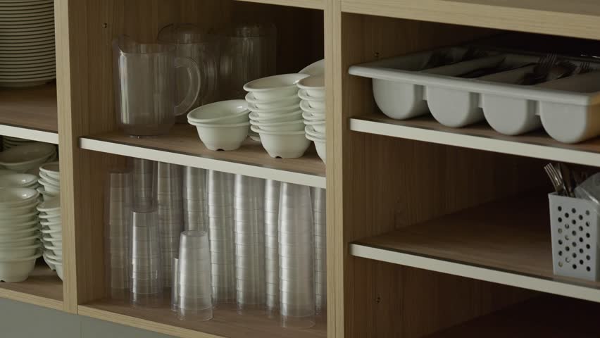 Effortlessly Organized Kitchen Shelving Featuring Elegant Glassware and Beautiful Dishes