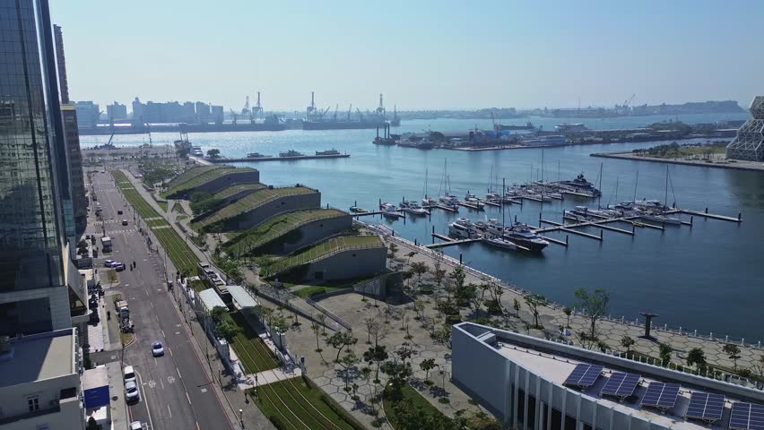 Aerial 4K footage of Kaohsiung City Skyline in Taiwan. It is the famous harbour in Kaohsiung, Taiwan.