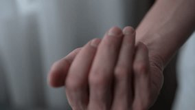 Slow motion revealing white medical pills in patient's palm, opening and closing hand in healthcare setting, close-up. Concept of medical treatment and medication process. Shooting in slow motion. - Powered by Shutterstock - Get 15% off with code: PIKWIZARD15