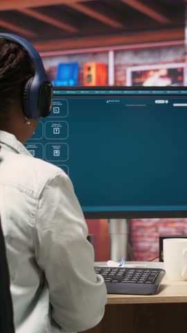 Vertical video Graphic designer designing UX for AI software turning text prompt into photos. IT specialist drinking coffee using machine learning tech to build text to image AI generative models