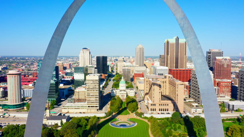 Aerial view of St. Louis, Missouri skyline on a sunny day, in front of the Gateway Arch park. St. Louis is an independent city in the U.S. state of Missouri.