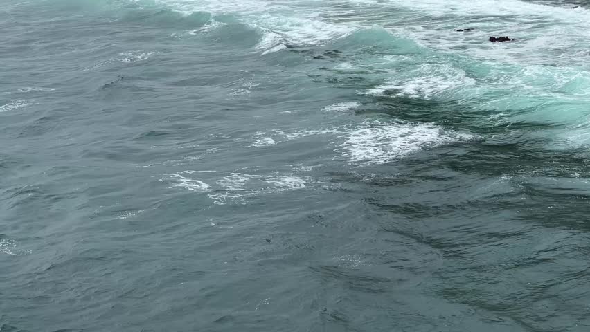 Calm wave in a tropical beach in Malang, Indonesia.