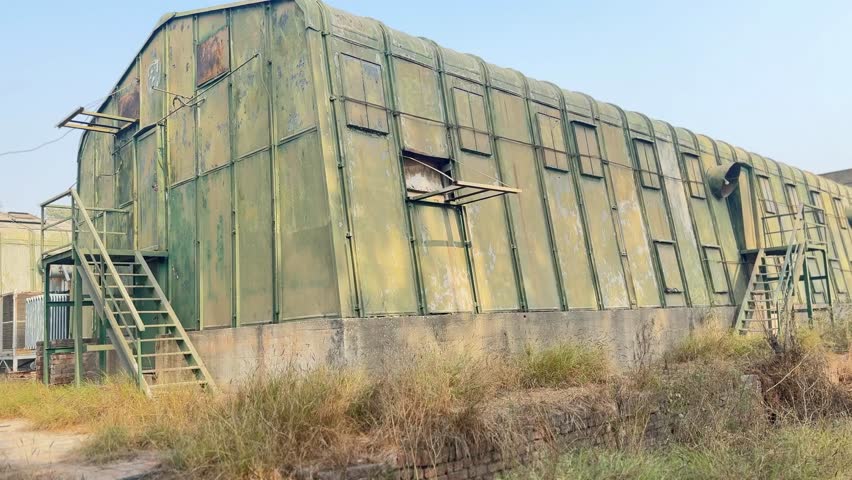 An old thermal power house refers to a facility used for generating electricity, typically based on older technologies and methods, where thermal energy is converted into electrical energy.
