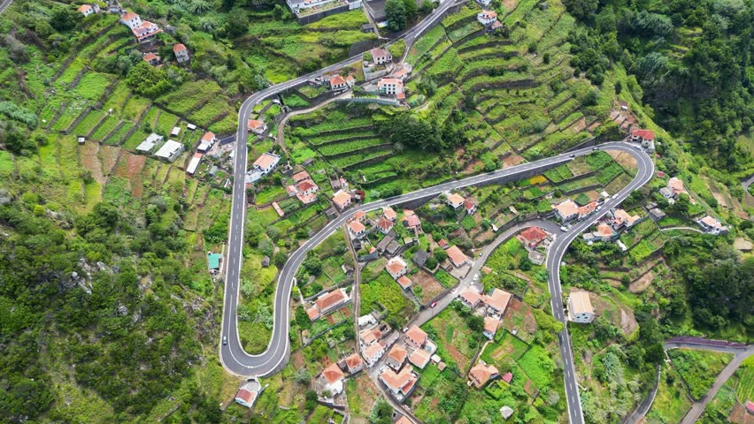 Aerial view of a mountain road through a village in Madeira, the beauty of mountain infrastructure