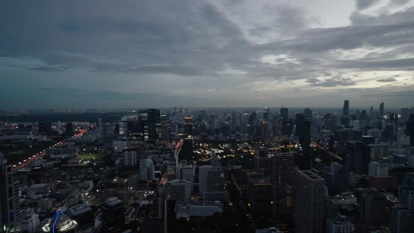 Bangkok City Panorama At Nighttime In Thailand. Aerial Drone Shot