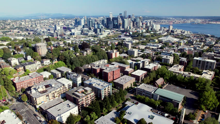 Breathtaking Aerial of Seattle City Skyline Above Neighborhoods