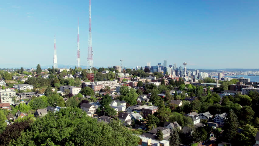 Seattle Neighborhoods Aerial with City Skyline Background