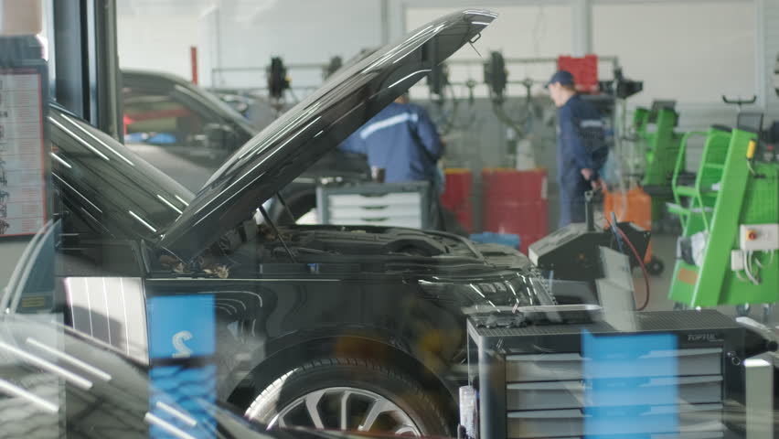 Cars Undergoing Maintenance in Auto Repair Shop
