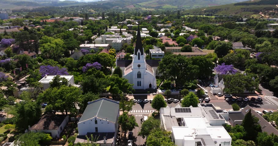 Cinematic Establishing Shot Above Quaint White Church in Stellenbosch, South Africa