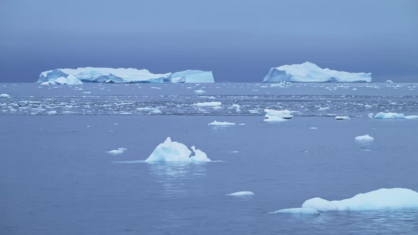 Beautiful Big Blue Antarctica Icebergs, Iceberg Floating in Antarctic Peninsula Ocean Sea Water in Cold Winter Weather, Low Angle and Wide Angle View of Seascape and Landscape Scenery