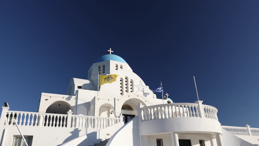 Church of Prophet Elias in Marina Mikrolimanou from Greece. Beautiful landscape 4k video with this orthodox Greek church against clean blue sky.
