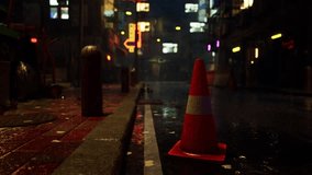 A bright neon traffic cone sits on the side of a road in a quiet Asian city on a rainy night. - Powered by Shutterstock - Get 15% off with code: PIKWIZARD15