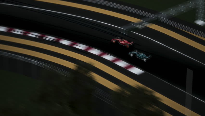 AERIAL High-speed racing action on a track as cars compete during intense race