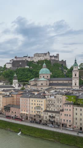Salzburg Austria time lapse day to night city skyline at Fortress Hohensalzburg (Vertical)