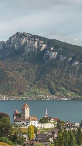 Spiez Switzerland time lapse city skyline at Lake Thun in autumn season (Vertical)
