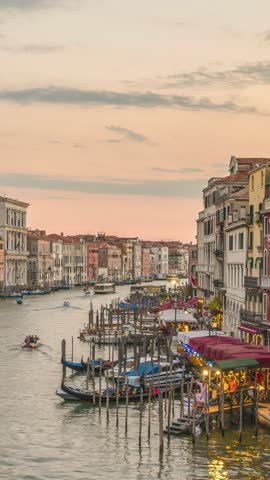 Venice Italy time lapse day to night sunset city skyline at Venezia Grand Canal (Vertical)