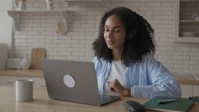Candid African Woman Talking Video Call and Look at Computer Webcam Online  - Powered by Shutterstock - Get 15% off with code: PIKWIZARD15