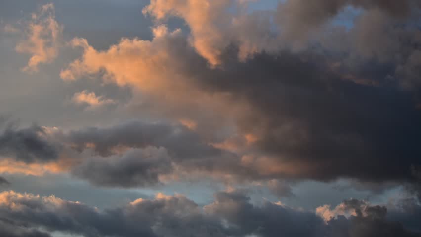 Dynamic Timelapse of Dramatic Clouds During Sunset. Nature