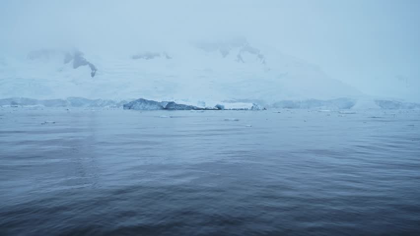 Winter Ocean Seascape in Antarctica Iceberg Mountains and Sea, Beautiful Dramatic Blue Coastal Landscape Scenery and Landscape on Antarctic Peninsula Coast, Icy Winter Sea Scene