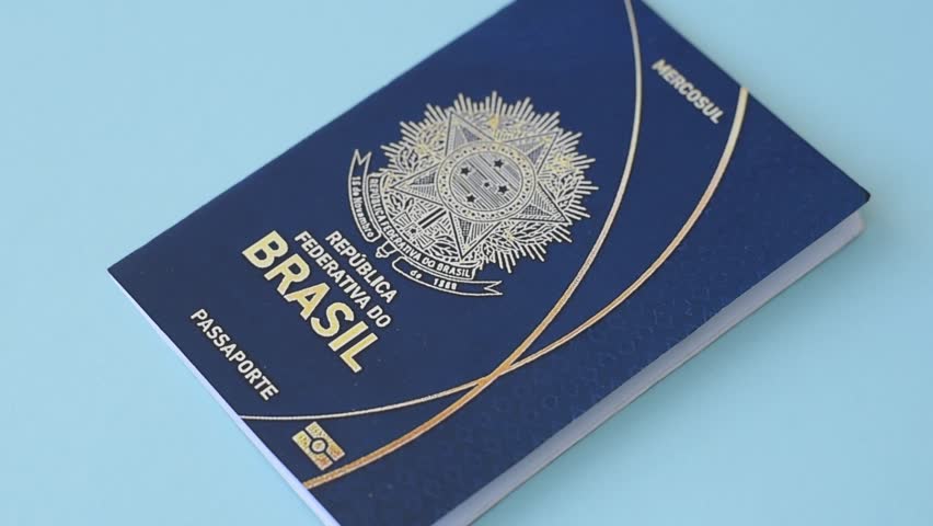 International passport of a citizen of Brazil on a blue background, international travel - Powered by Shutterstock - Get 15% off with code: PIKWIZARD15