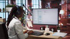 Cheerful software developer at computer waiting for code to finish compiling, celebrating after managing to make it run without errors. Woman happy after finishing work on algorithm scripts, camera A - Powered by Shutterstock - Get 15% off with code: PIKWIZARD15