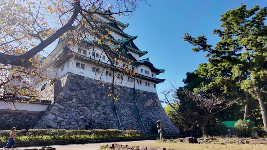 Nagoya , Japan - 11 07 2024: Nagoya Castle on an Autumn Day With Clear Blue Skies