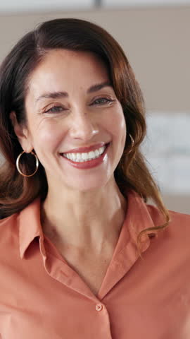 Face, friendly and smile of business woman in creative workplace for professional design career. Experience, optimism and teeth of happy mature employee in office or agency for development and growth