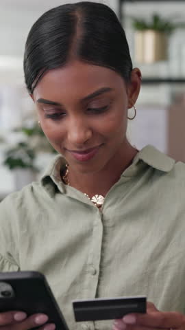 Woman, logistics and credit card with phone, payment and boxes at warehouse, startup and e commerce. Person, online shopping and computer with mobile app, fintech and bills at office for distribution