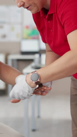 First aid, bandage and hands of people in office for workplace Injury, safety protocol and security guidelines. Insurance policy, medical liability and emergency with employees for accident and help