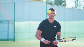 tennis player exercising on court in summer day, sportive man throwing ball by racket, workout for keeping fit and stay healthy outdoors in sunny morning, sport activity and healthy lifestyle - Powered by Shutterstock - Get 15% off with code: PIKWIZARD15