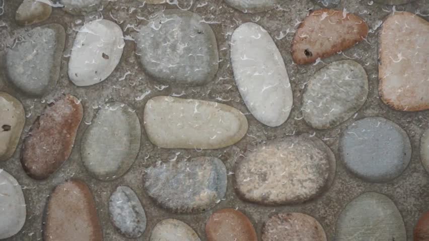 ceramic floor with an aesthetic ceramic stone motif at the front of the house