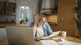 Female calculating family budget financial and accounting at home, young woman working with financial data calculator with tablet computer and writing make note calculate, pay bills tax online - Powered by Shutterstock - Get 15% off with code: PIKWIZARD15