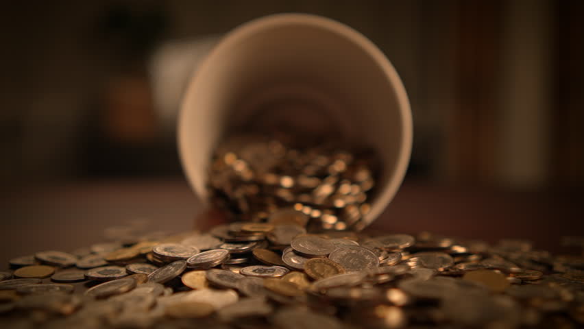 Change cash coins money dropping on table in slow motion