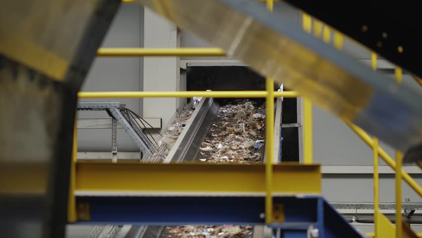 Garbage Recycling Factory line, Plastic cubes for recycle Plant, Bales of pressed boxes, rubbish warehouse collection. Preparation of recyclables for recycling, Plastic city garbage.