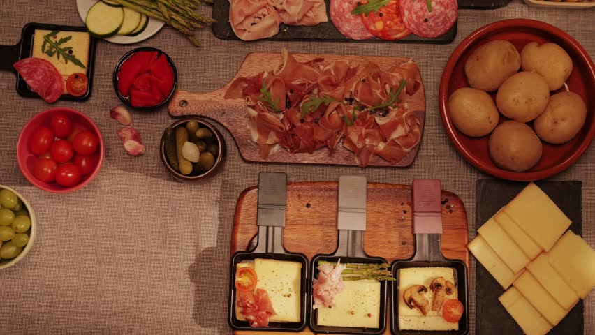 Italian or Spanish restaurant with traditional tapas food, Spanish cuisine, delicious tapas and cheese plate, bruschetta with cheese, olives dry tomatoes and tasty sandwich bar appetizer, buffet