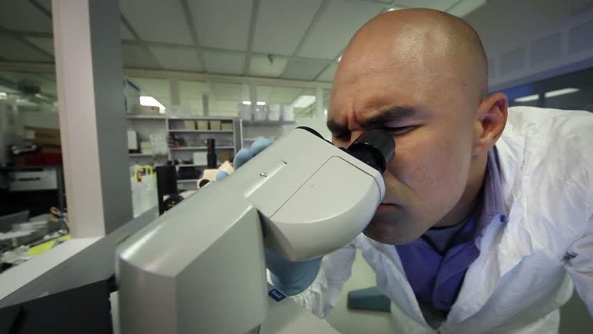 Scientist's reactions are magnified to a comical effect with a fish eye lens