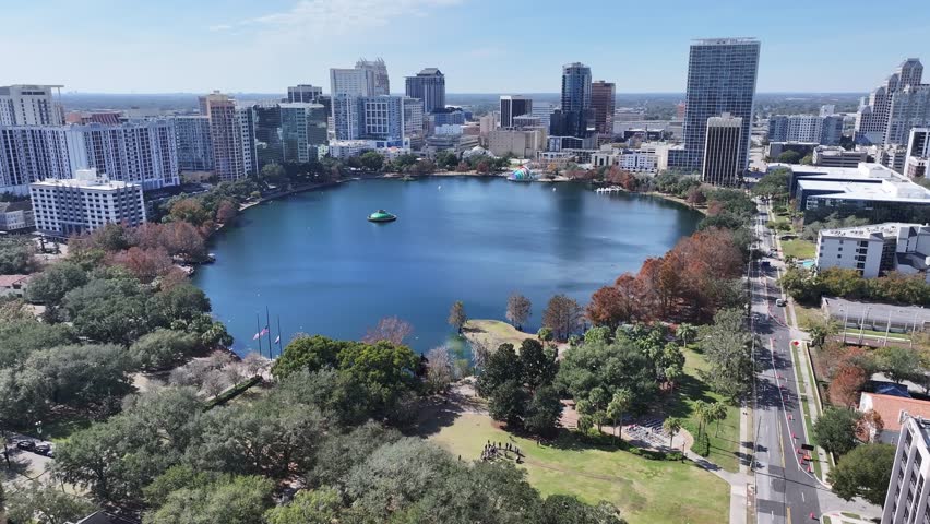 Orlando Skyline At Orlando Florida United States. Bird Eye View Of Stunning Iconic Recreational Park Of The City. Business Sky Clouds Downtown Cityscape. Backgrounds Famous. Orlando Florida.