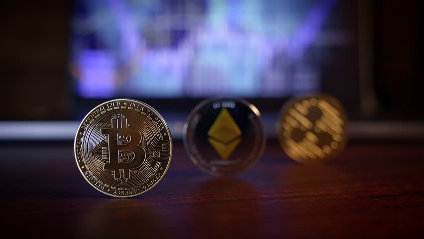 Cryptocurrency Coins Beautifully Arranged on a Wooden Table with a Dynamic Digital Background