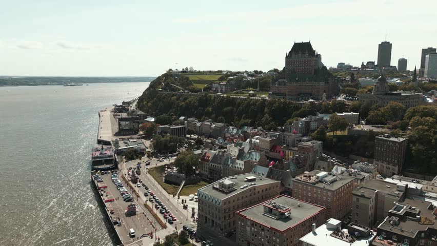 This 4K 60fps aerial video captures the Château Frontenac, Quebec City’s historic ramparts, Terrasse Dufferin, and St. Lawrence River on a vibrant autumn day. Perfect for ads, documentaries.