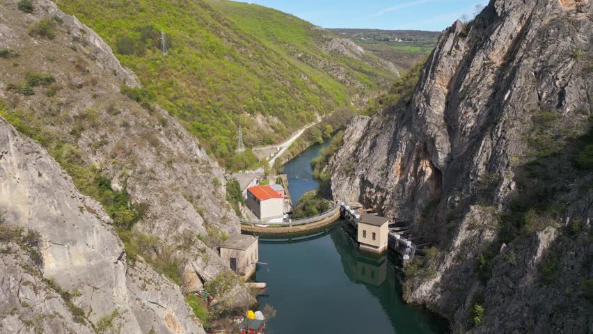 The dam of Matka Lake nestled within the serene natural environment of the canyon