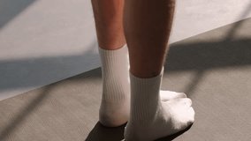 Athletic lifestyle. Aerobic workout. Active people stepping barefoot on sport mat before star pilates class training session with female fitness coach in gym studio indoors. - Powered by Shutterstock - Get 15% off with code: PIKWIZARD15