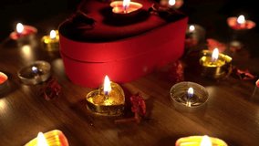 Happy Valentine's day: Romantic candlelit dinner. Table is set for Valentines day celebration with red and pink color lights and heart shaped candles. valentine's day romantic setting valentine's dinn - Powered by Shutterstock - Get 15% off with code: PIKWIZARD15